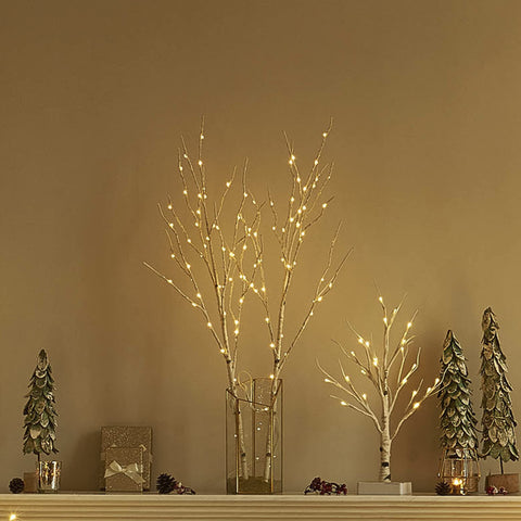 BAOLITVINE bedroom scene with branch lights creating soft ambiance