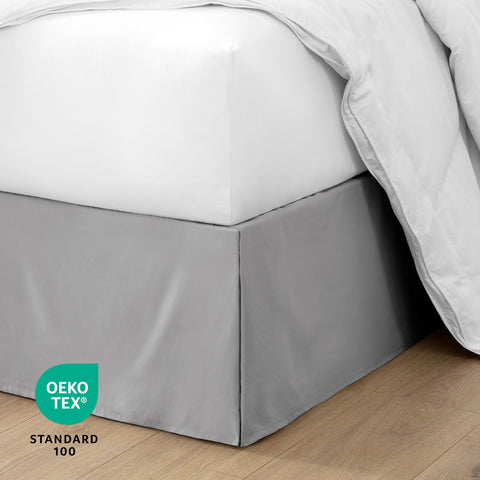 Bare Home bed skirt hiding under-bed storage for clutter-free room