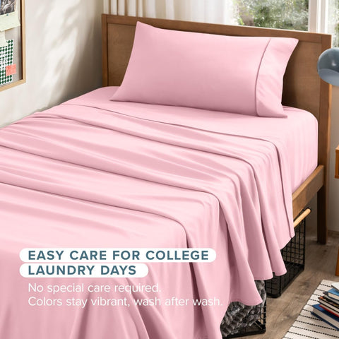 Bare Home bed styled in light pink, demonstrates calming bedroom aesthetic