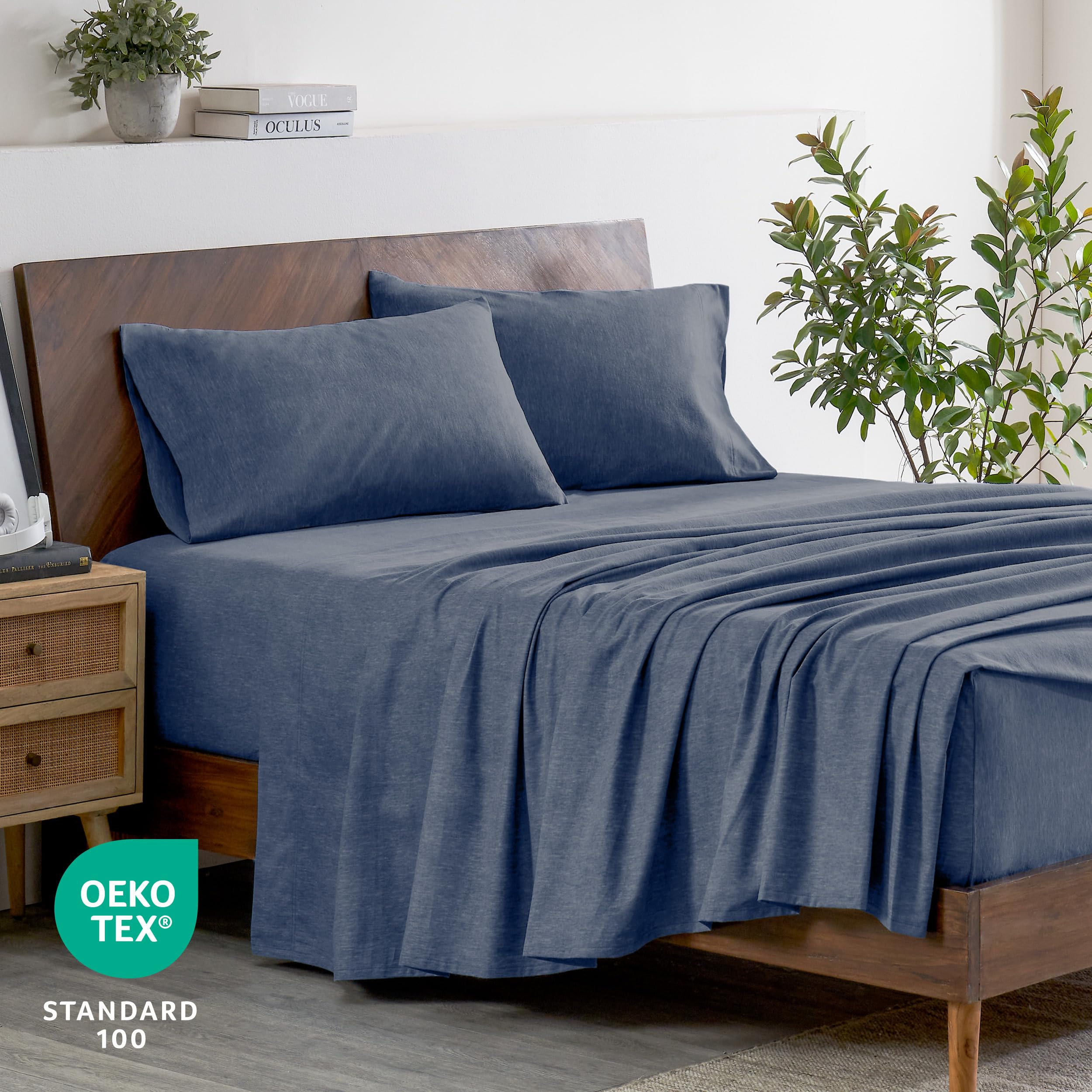 Bare Home made bed in bedroom, cozy winter-ready linen styling