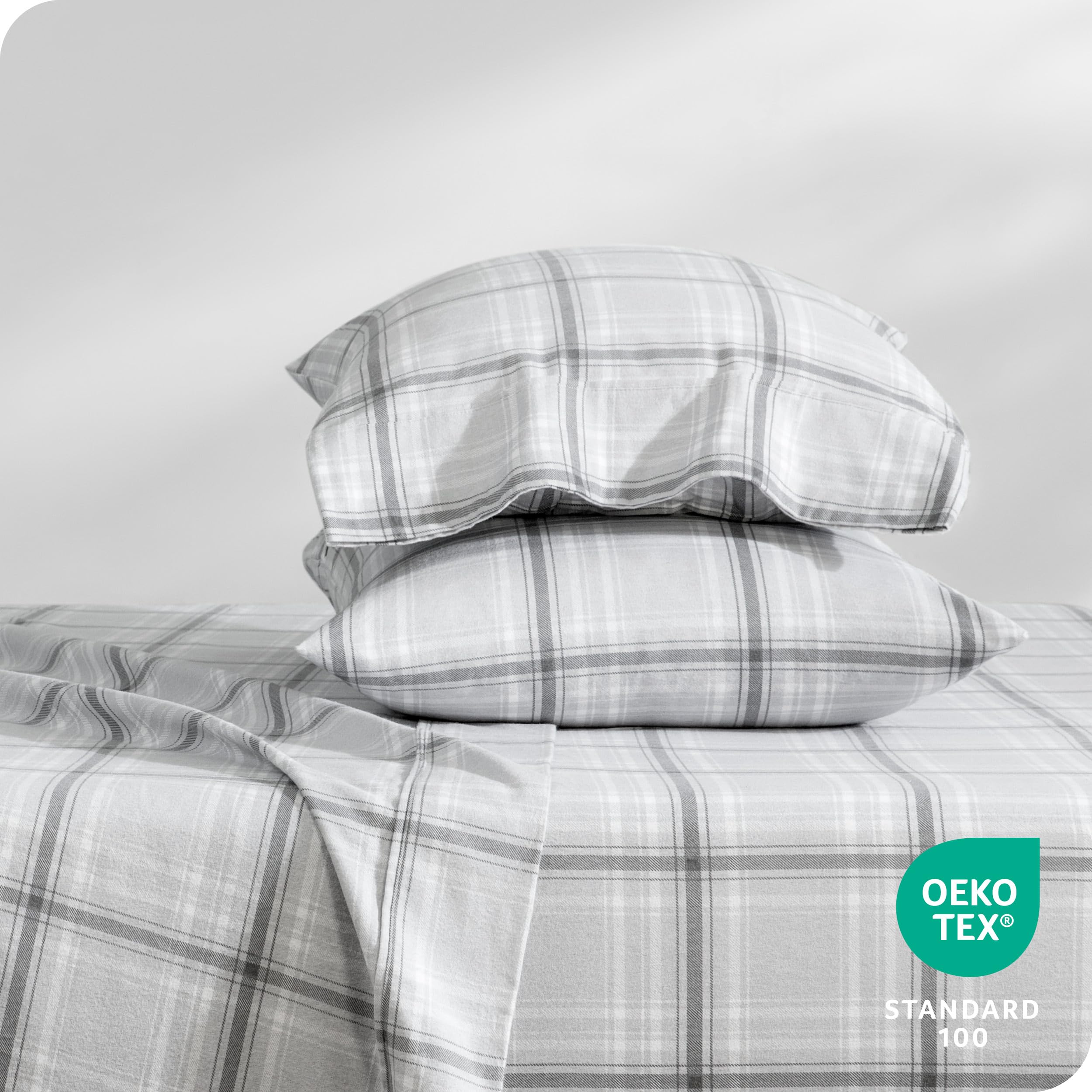 Bare Home lifestyle bedroom with plaid styling showing cozy layered decor