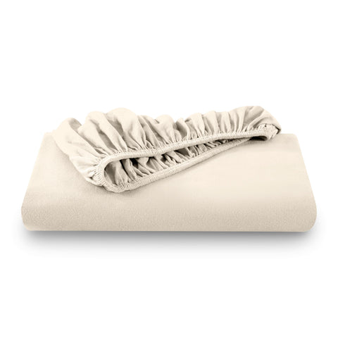 Bare Home lifestyle scene in sand color showing inviting bed and comfortable sleep environment