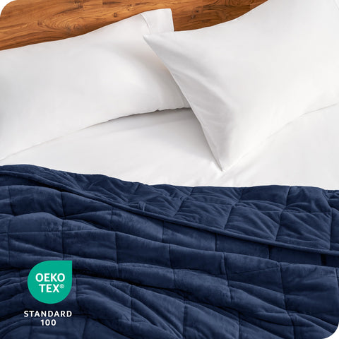 Bare Home hands pressing fabric to show texture and soothing tactile quality