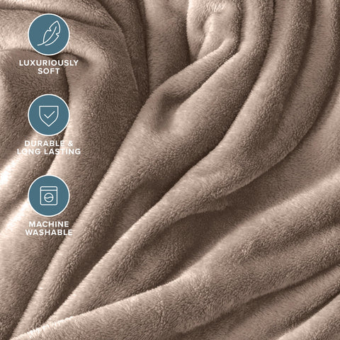 Bare Home blanket draped on sofa showing cozy living-room use