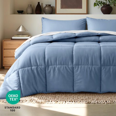 Bare Home comforter folded beside ruler showing true twin size