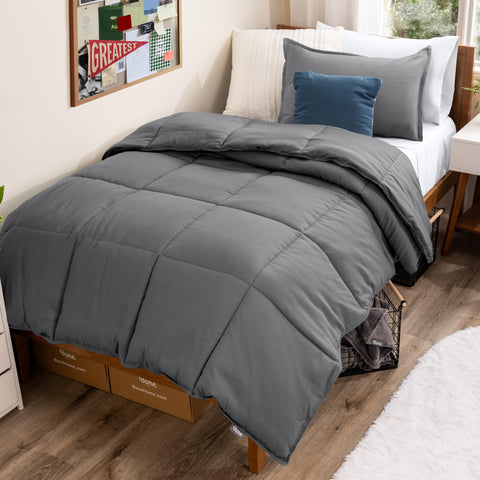 Bare Home comforter front view showing clean grey surface and cozy benefit