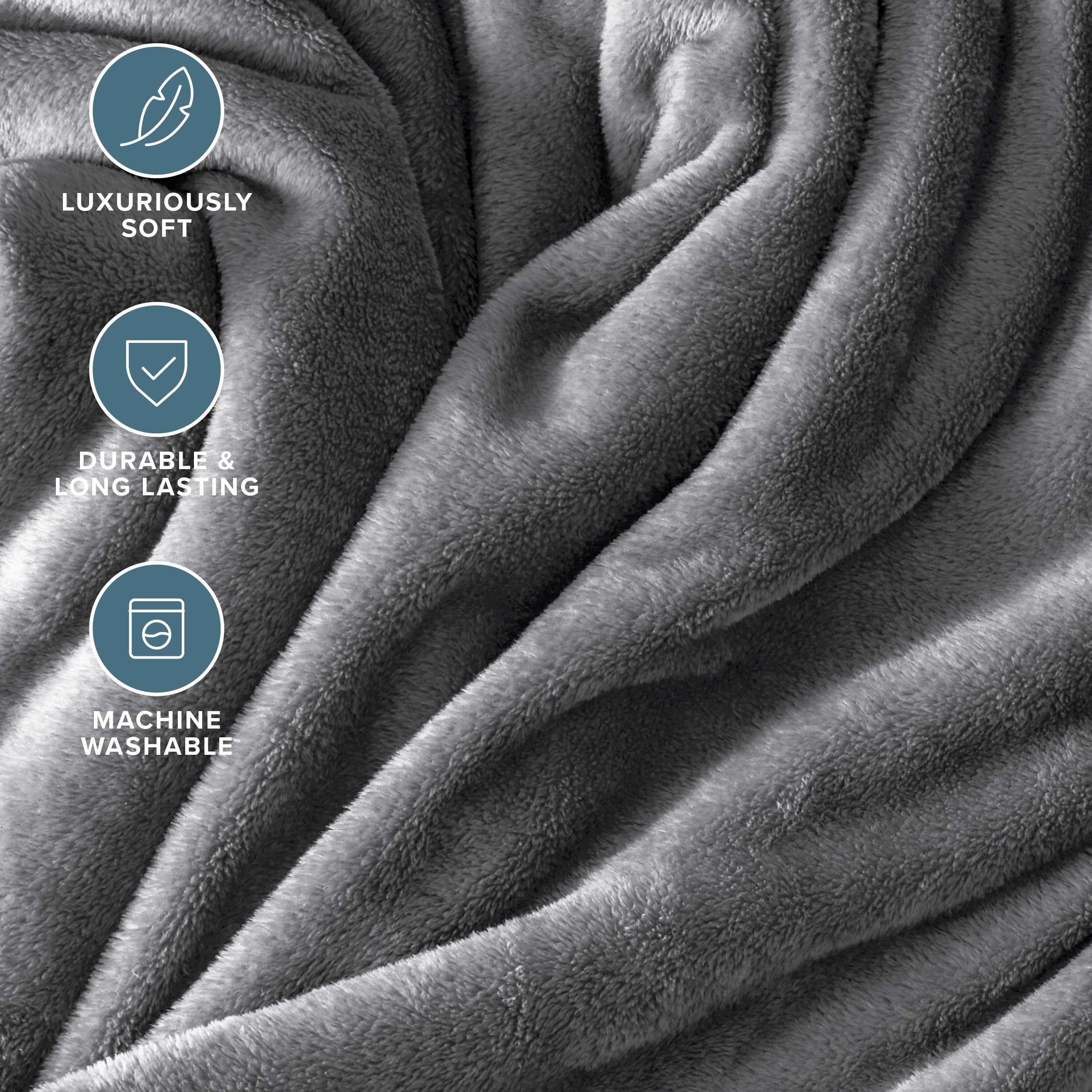 Bare Home blanket draped over couch creating inviting living-room warmth