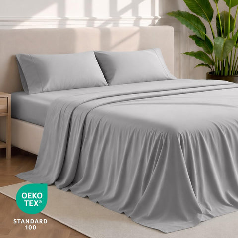 Bare Home flat sheet neatly spread on bed to show full coverage and smooth drape