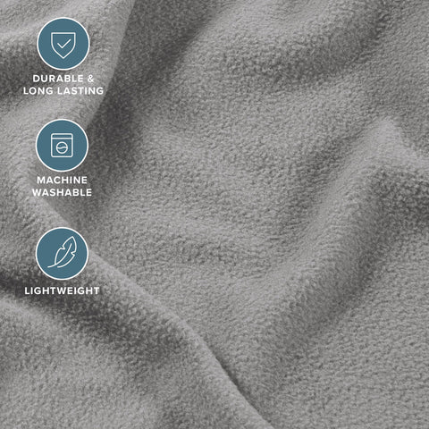 Bare Home flat sheet spread on bed illustrating full coverage and smooth tuck-in benefit