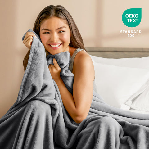 Bare Home folded blanket demonstrating size and compact storage convenience