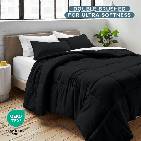 Bare Home comforter folded beside washer illustrating easy machine-wash convenience