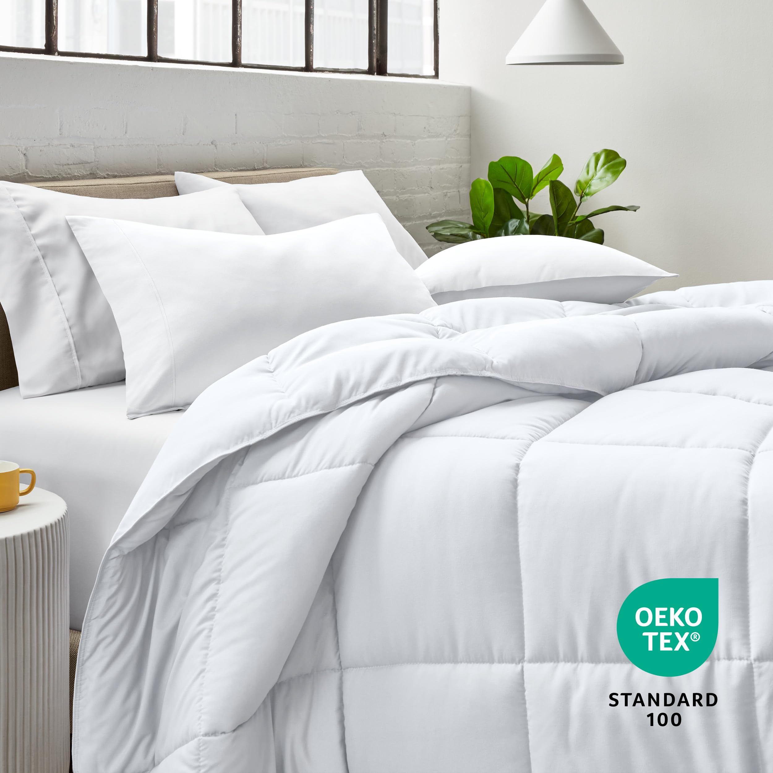 Bare Home folded comforter demonstrating compact storage and wrinkle resistance