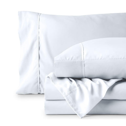 Bare Home size comparison on mattress showing Full XL dimensions and proper fit benefit