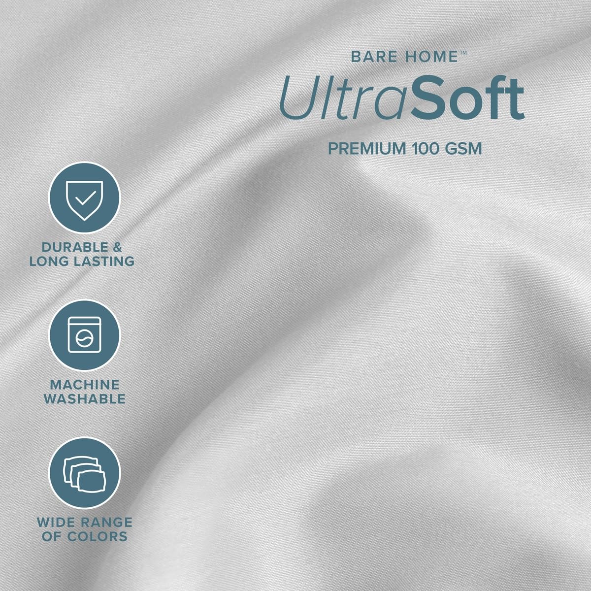 Bare Home flat sheet spread on queen bed, demonstrates full coverage and drape