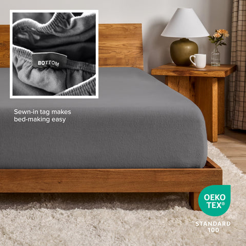 Bare Home neatly folded fitted sheet ready for storage, saving closet space