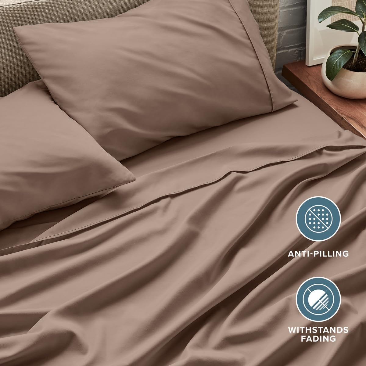 Bare Home neatly folded sheets in storage showing compact organization