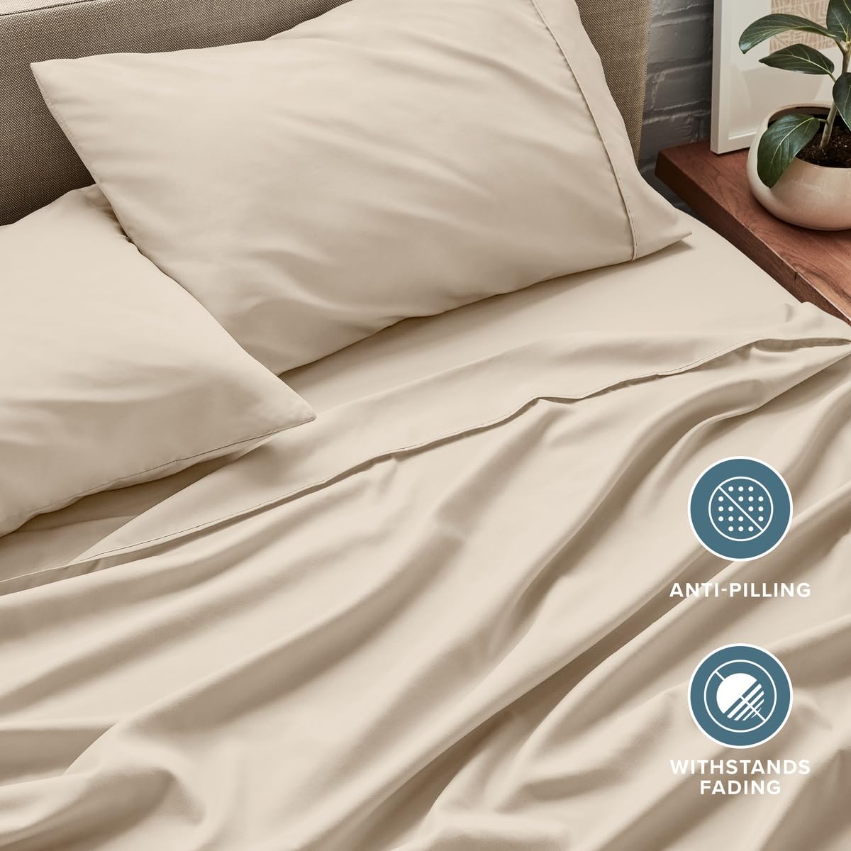 Bare Home bed styled in modern bedroom showing calming sand tone benefit