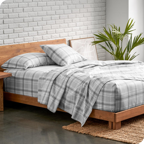 Bare Home two Twin XL fitted sheets stacked showing secure split-king fit