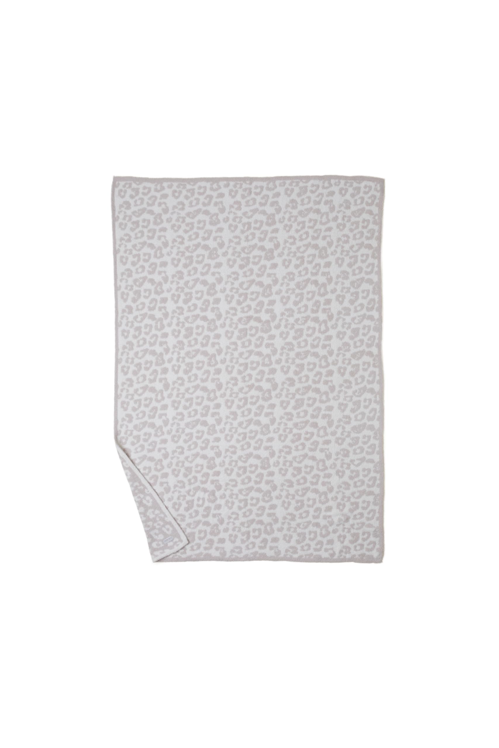 Barefoot Dreams folded throw edge detail showing ribbed finish and durable knit