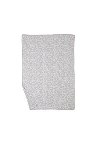 Barefoot Dreams folded throw edge detail showing ribbed finish and durable knit