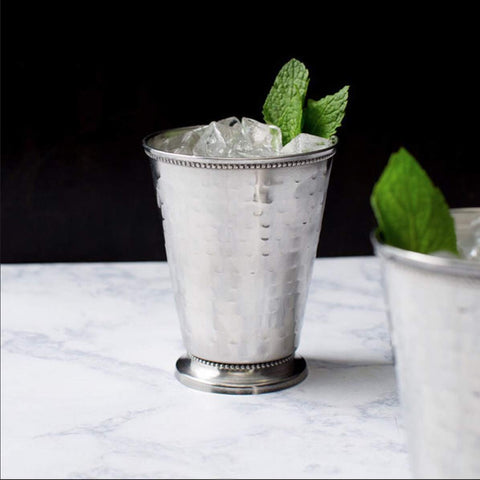 Barfly julep cup in use with mint julep showing chilled serving benefit