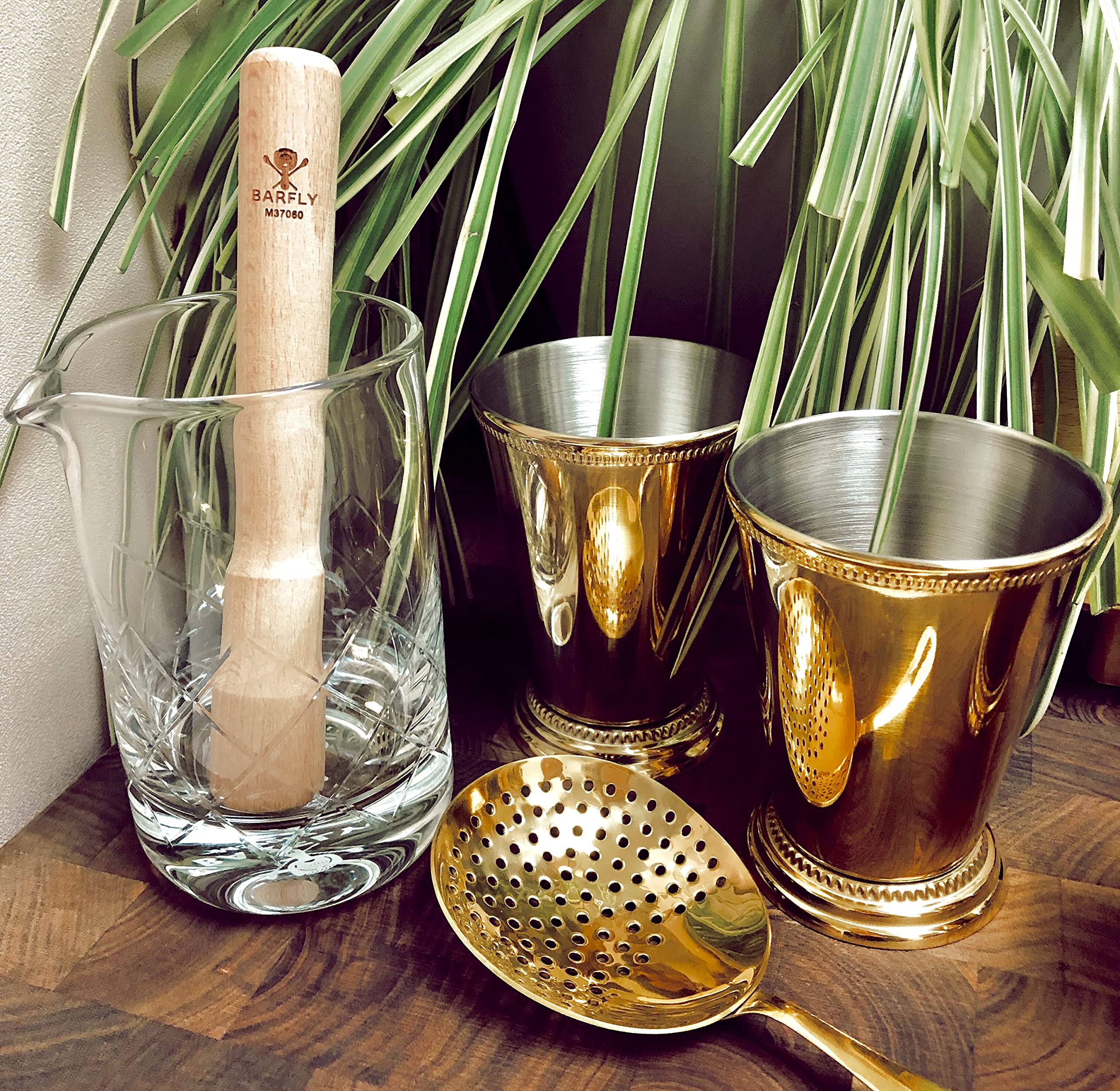 Barfly julep cup scale with hand illustrating true 12 oz capacity benefit