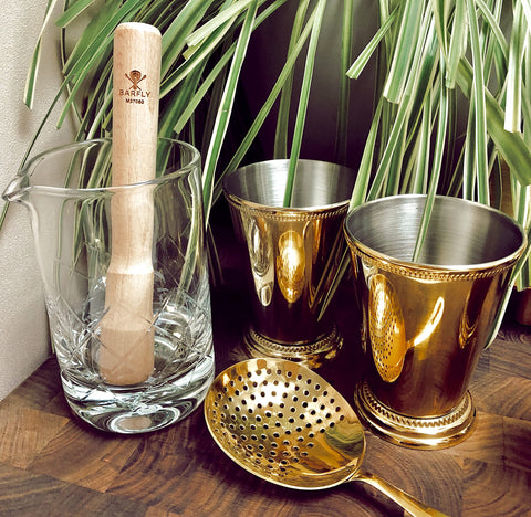 Barfly julep cup scale with hand illustrating true 12 oz capacity benefit