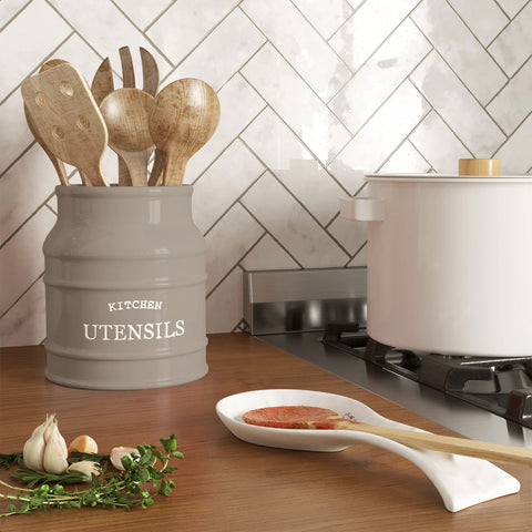 Barnyard Designs utensil holder beside a stove showing compact footprint benefit
