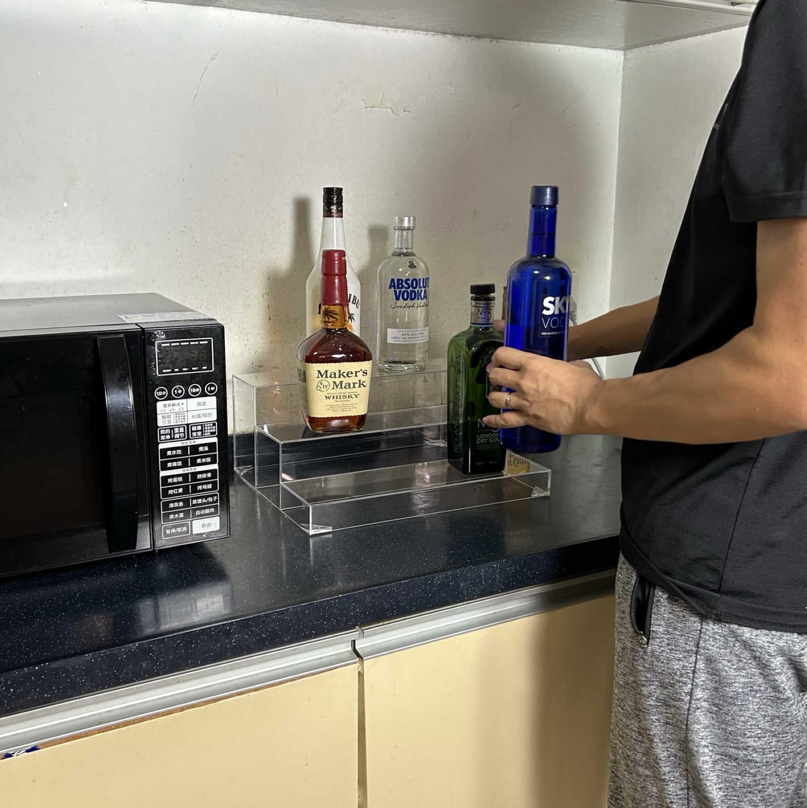 BARsics beside hand for size comparison indicating compact footprint benefit