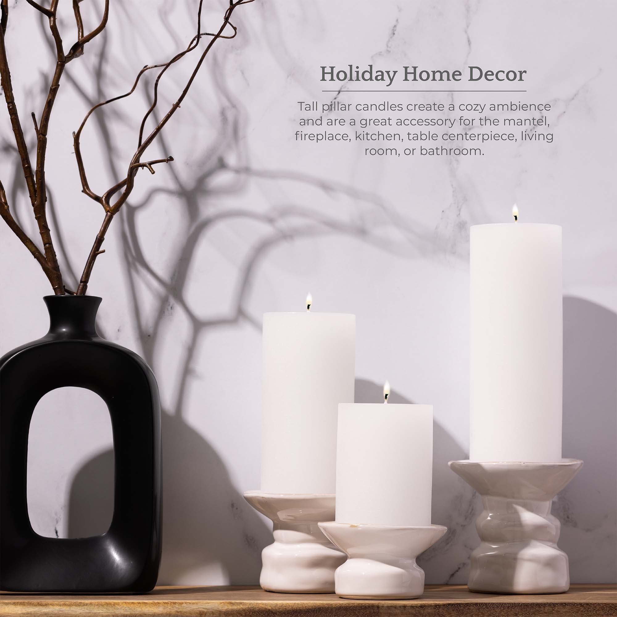 Bask candles arranged as dining centerpiece creating warm, uncluttered ambiance