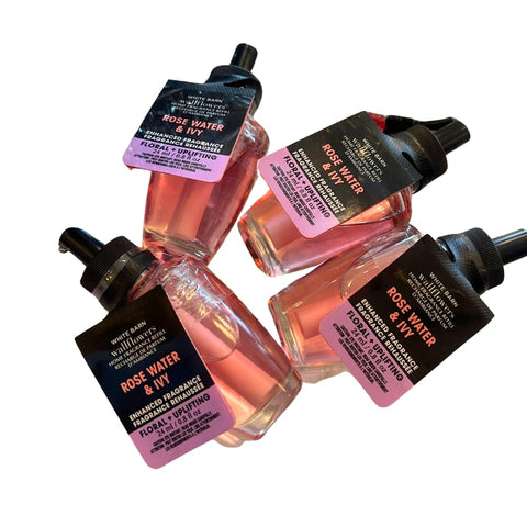 Bath & Body Works refill next to hand showing compact size and easy install