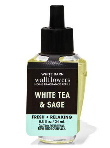 Bath & Body Works Wallflowers refill installed in plug diffuser in living room, demonstrating easy scent delivery