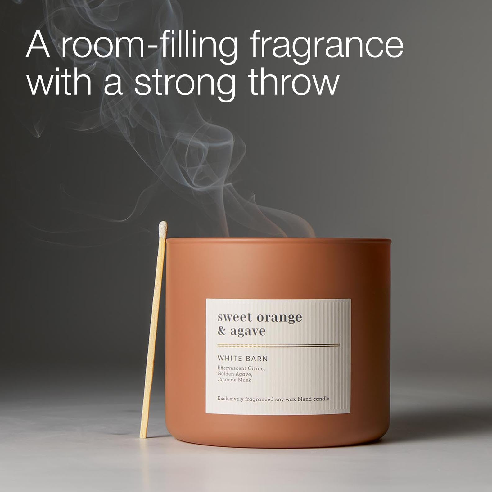 Bath & Body Works candle in living room setting adding bright, uplifting aroma