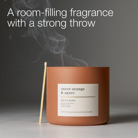 Bath & Body Works candle in living room setting adding bright, uplifting aroma
