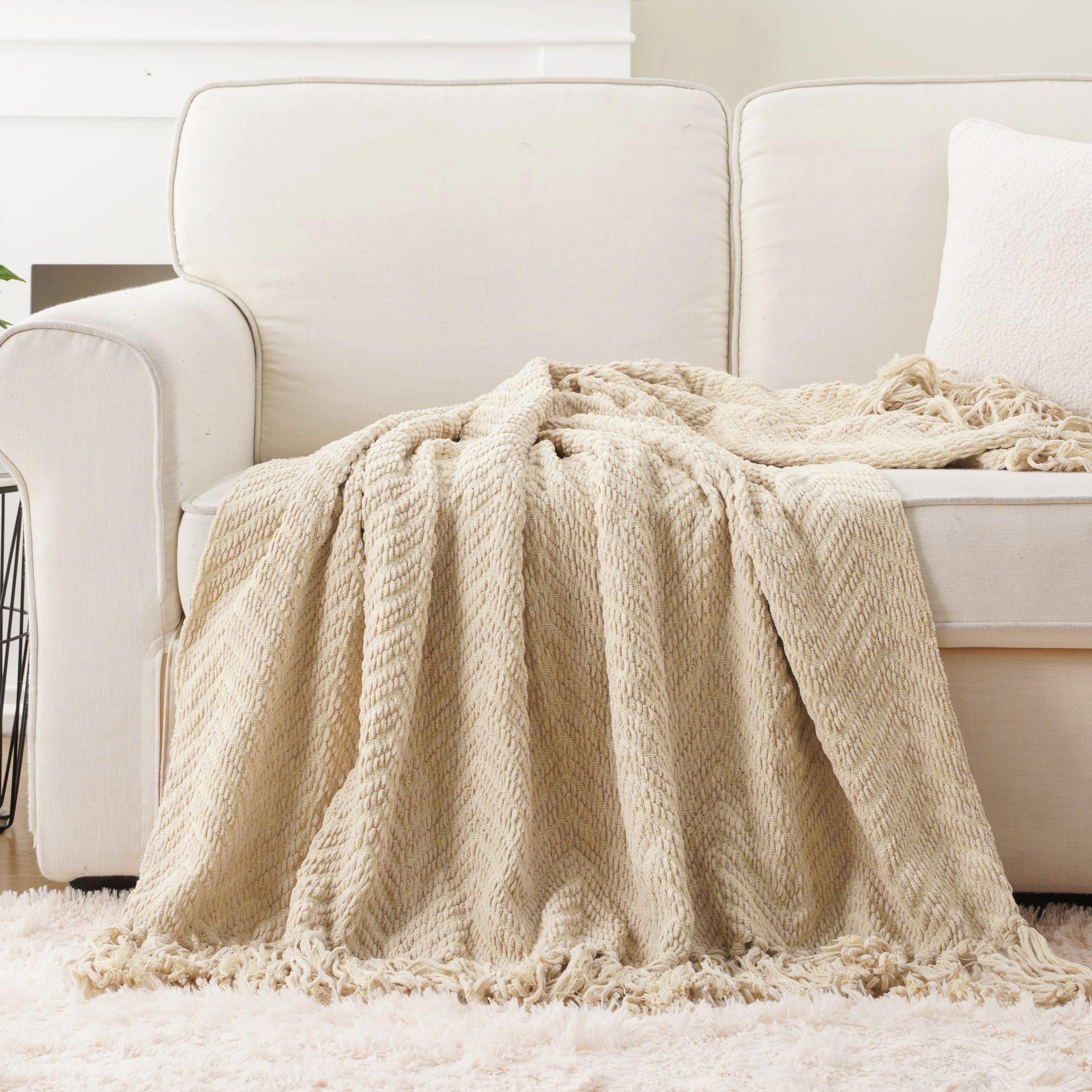 BATTILO HOME folded throw on bed illustrating neat styling and bedroom accent