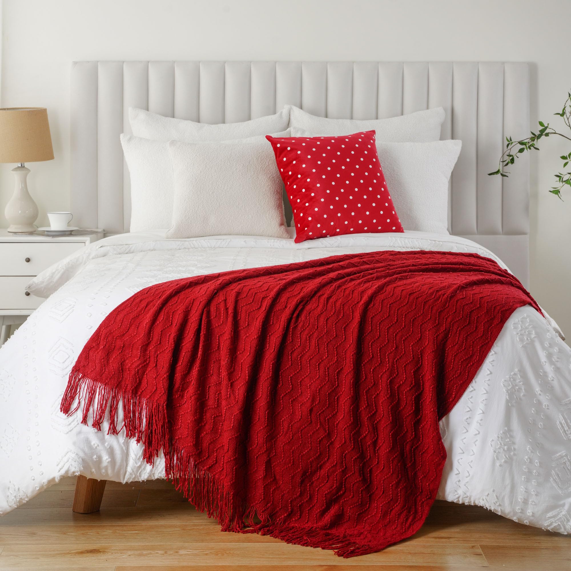 BATTILO HOME blanket folded at foot of bed offering a neat accent and lightweight warmth