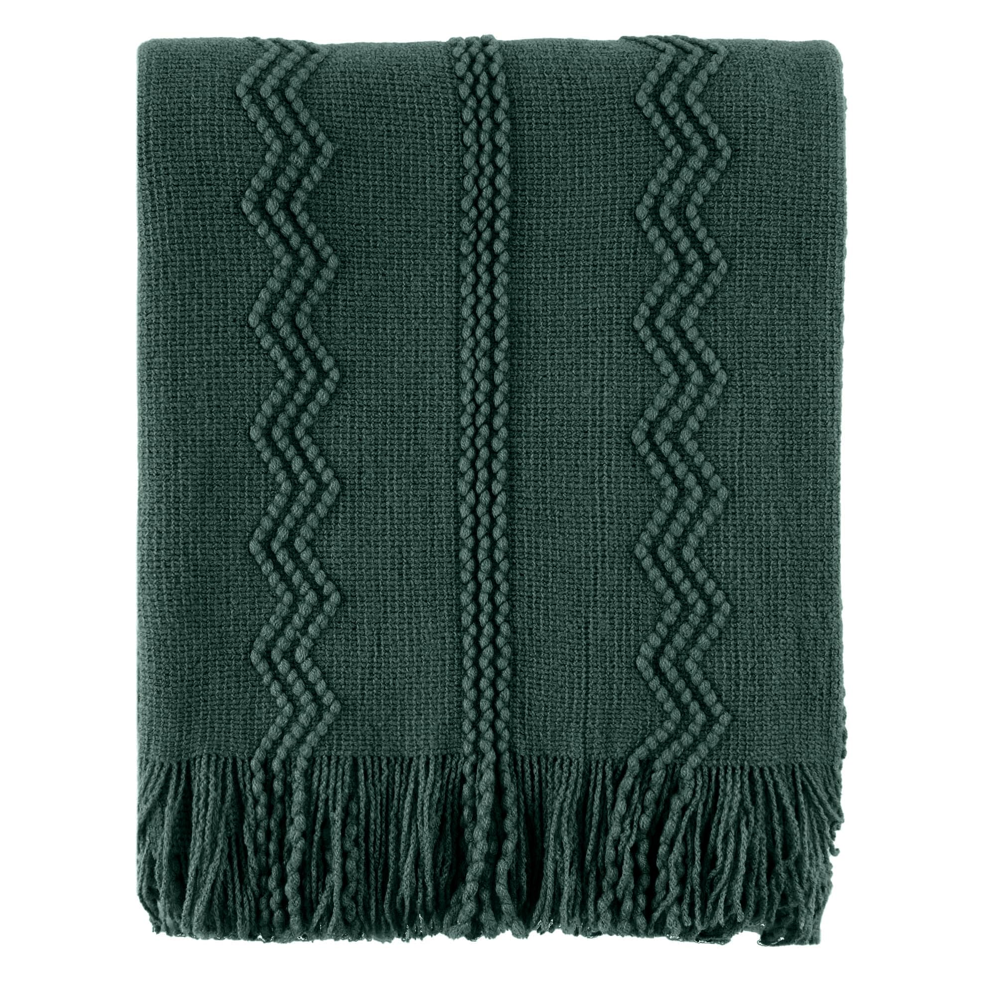 BATTILO HOME front view of green throw showing festive couch accent