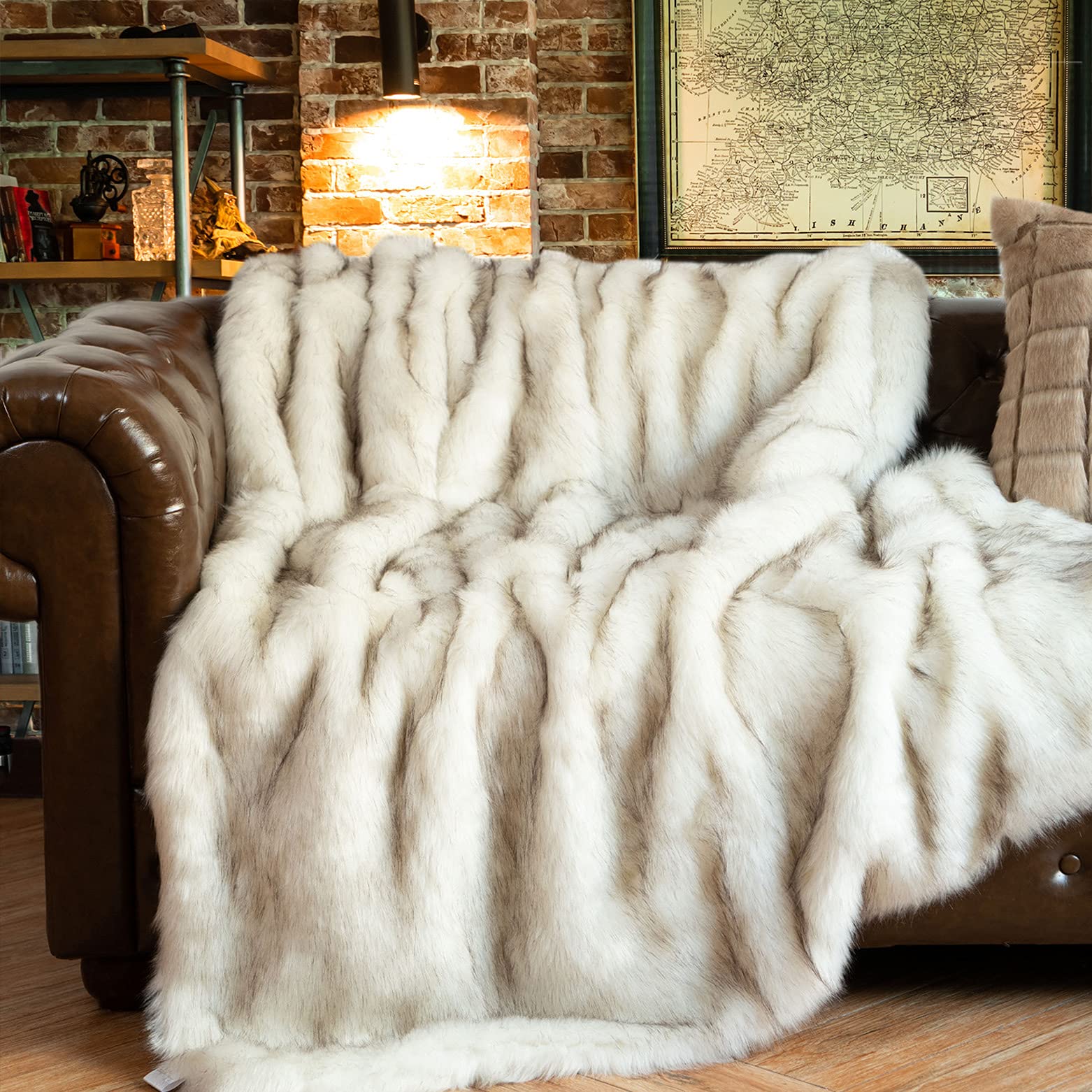 BATTILO HOME front view of white faux fur throw showing elegant packaging and design benefit