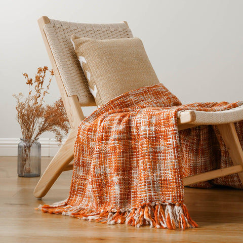 BATTILO HOME throw in hand for scale showing lightweight portability benefit