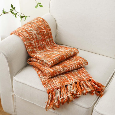 BATTILO HOME throw casually draped on sofa adding cozy living room accent