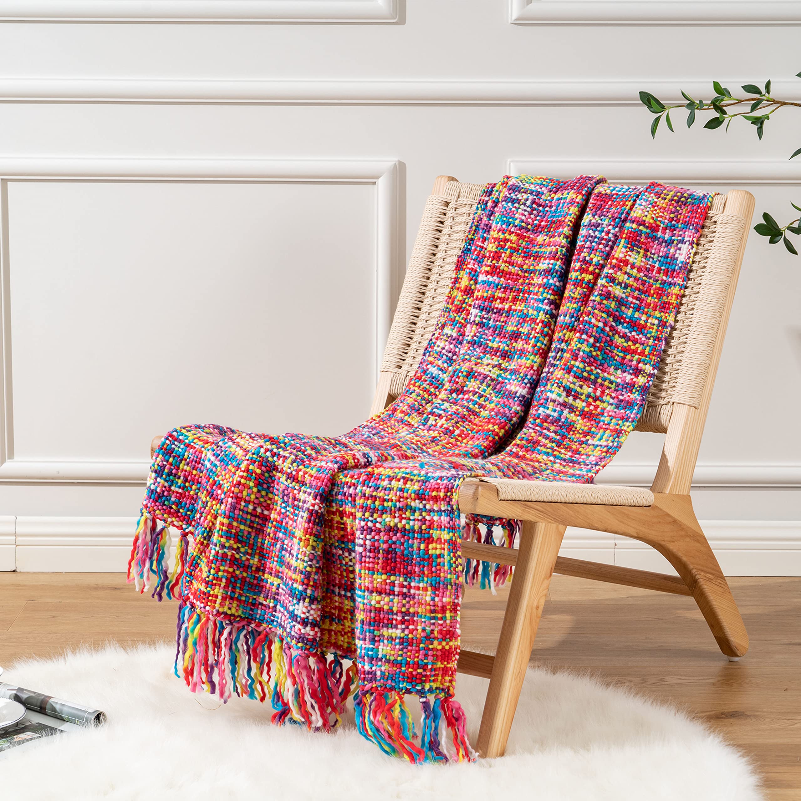 BATTILO HOME draped over sofa adding color and cozy appeal