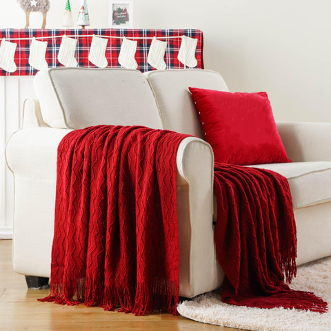 BATTILO HOME burgundy throw draped over sofa to create warm, inviting seating comfort