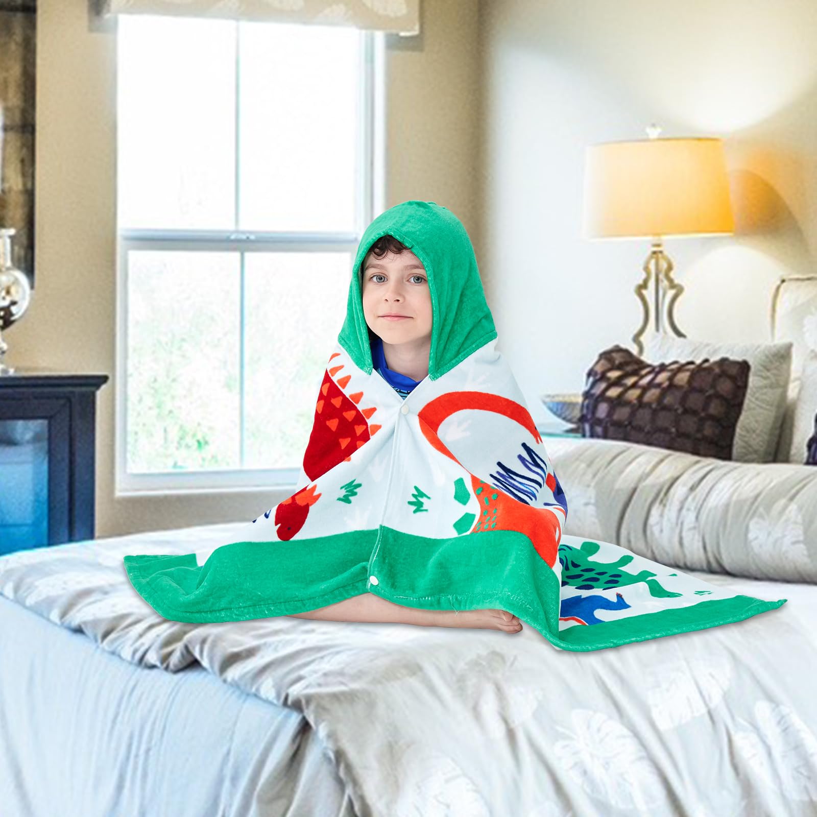Bavilk poncho size comparison with child demonstrating generous fit