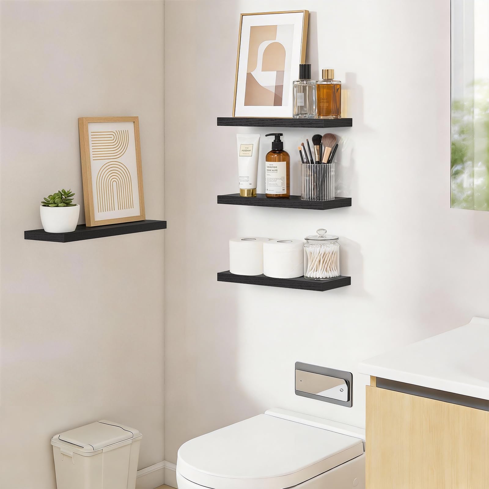 BAYKA shelf beside book and plant to show scale and space-saving benefit