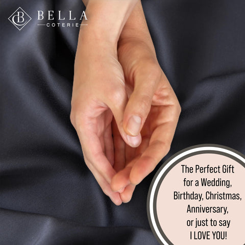 BC BELLA COTERIE hands touching fabric to show soft texture and breathability