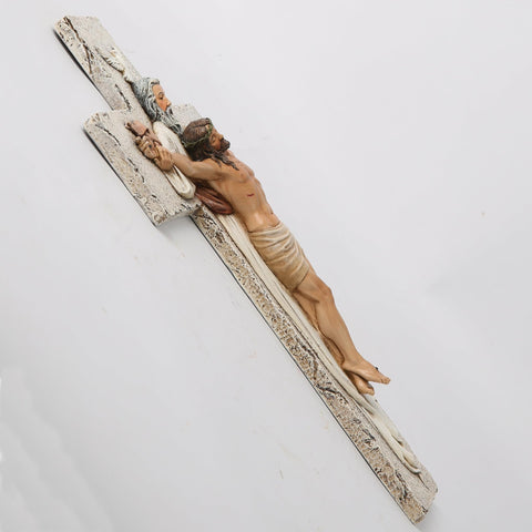 BC BUILDCLASSIC crucifix next to book showing size and scale for placement planning benefit