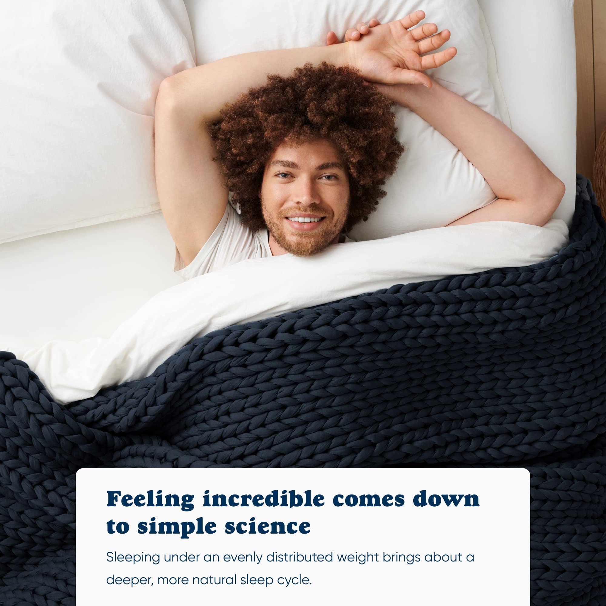 Bearaby blanket draped on bed showing cooling breathability and cozy bedroom styling