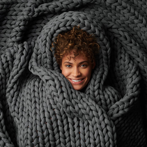 Bearaby Napper front view showing Asteroid Grey color and cozy appeal