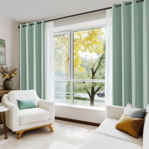 Beauoop curtains covering a sliding door illustrating full-width blackout and insulation benefit