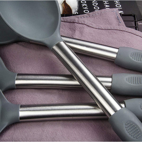BECBOLDF utensils held in hand showing scaled size and ergonomic handling benefit